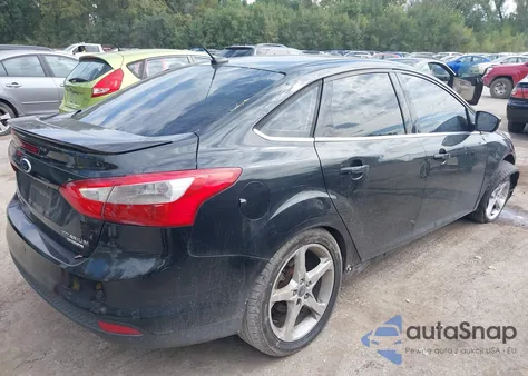 2013 Ford Focus Titanium z USA, uszkodzony, nr VIN 1FADP3J23DL169468